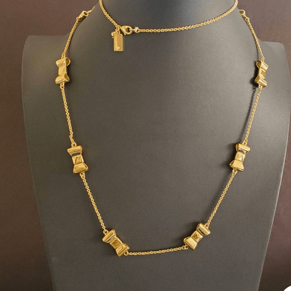 KATE SPADE GOLD BOW NECKLACE - New York take a bow